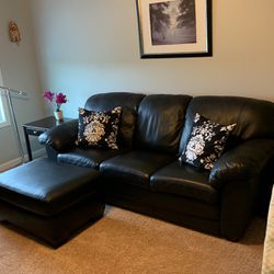 Black Leather Sofa with matching ottoman 