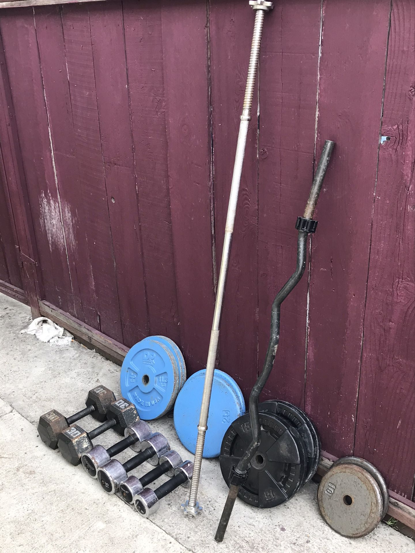 Standard straight bar, standard curl bar, and weights plates!! All 1in. Plus dumbells