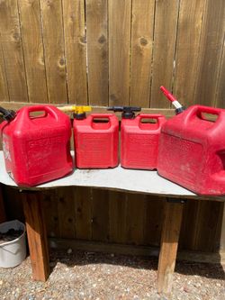 Fuel containers-Plastic- 2- 5 gallon and 2- 2-1/2 gallon