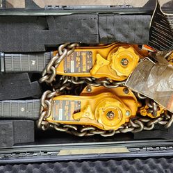 Pair Harrington 2 3/4 ton lever hoisting with rolling case.