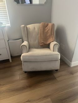 Tan rocking chair