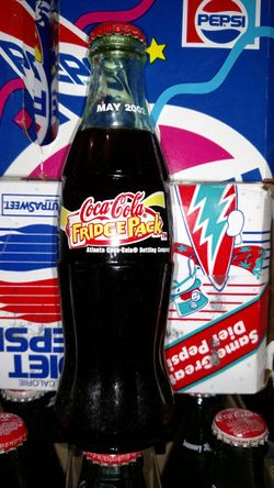 Coca Cola Fridge pack employee's bottle