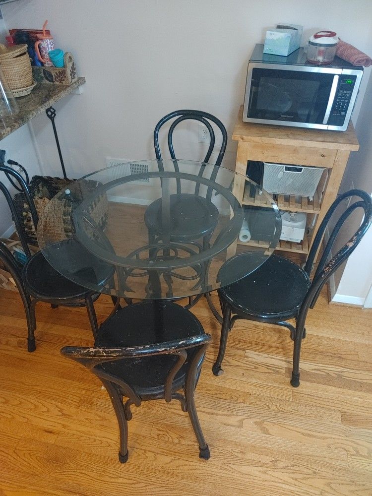 Glass Top With Black Metal Frame Kitchen Table (38" Diameter) And Chairs