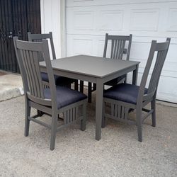 TABLE. AND FOUR CHAIRS.  