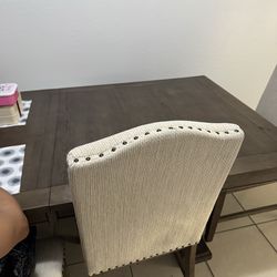 Wood table with 4 chairs and a bench