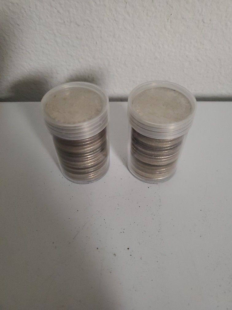 Morgan Silver Dollars (2) Rolls.