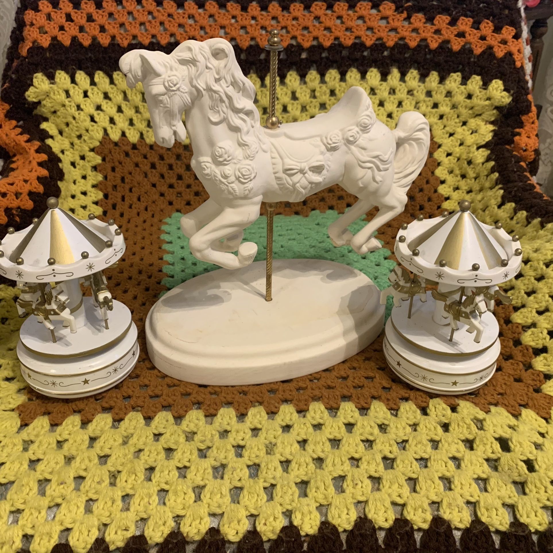 Ceramic horse with two musical Carousels