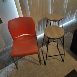 2 Bar Stools And A Bright Orange Chair (Does Not Have To Be Sold Together)