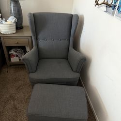 STRANDMON Armchair and ottoman, Nordvalla dark gray