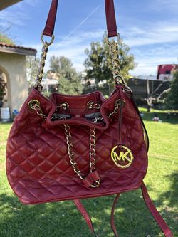 Red leather Micheal kors bag with original bag