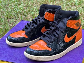 Nike Air Jordan 1 Retro High OG "Shattered Backboard 3.0" sneakers, notable for their glossy, crinkled patent leather