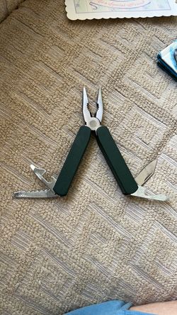 Multi-Tool Pliers with Folding Blades