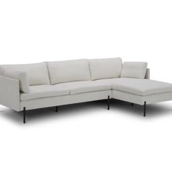 New in the Box 102" Wide Right Hand Facing Down Cushion Sofa & Chaise.  Fabric: White with Cream  Down Fill Cushions Plush Seat Seat Depth: Standard (