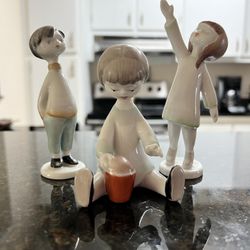Four Miniature Lladro Pieces