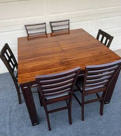 7-PC HIGH TOP BROWN FINISHED DINING SET (TABLE WITH EXTENSION LEAF AND 6 PADDED CHAIRS)