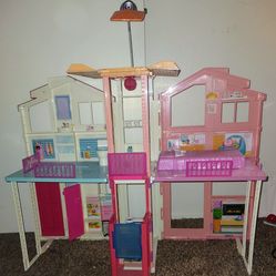 Barbie pink passport dream house