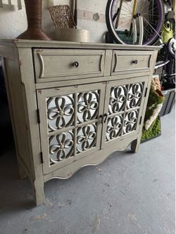 Distressed accent cabinet