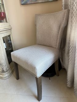 Upholstered Statement Dining Chair with Nailhead Trim