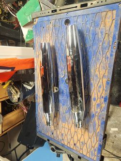 Stock slip on muffler for Harley-Davidson