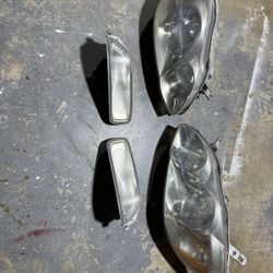 2004 Toyota Corolla OEM Headlights and Fog Lights
