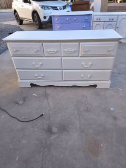 Freshly sanded and painted high quality wood seven drawer dresser