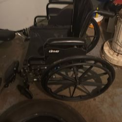 The image shows a Ki Mobility Tsunami ALX wheelchair, known for its lightweight and responsive design. 