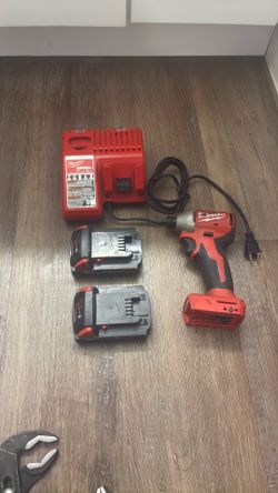 Milwaukee M18 brushless impact drill, charger & 2 Batteries…