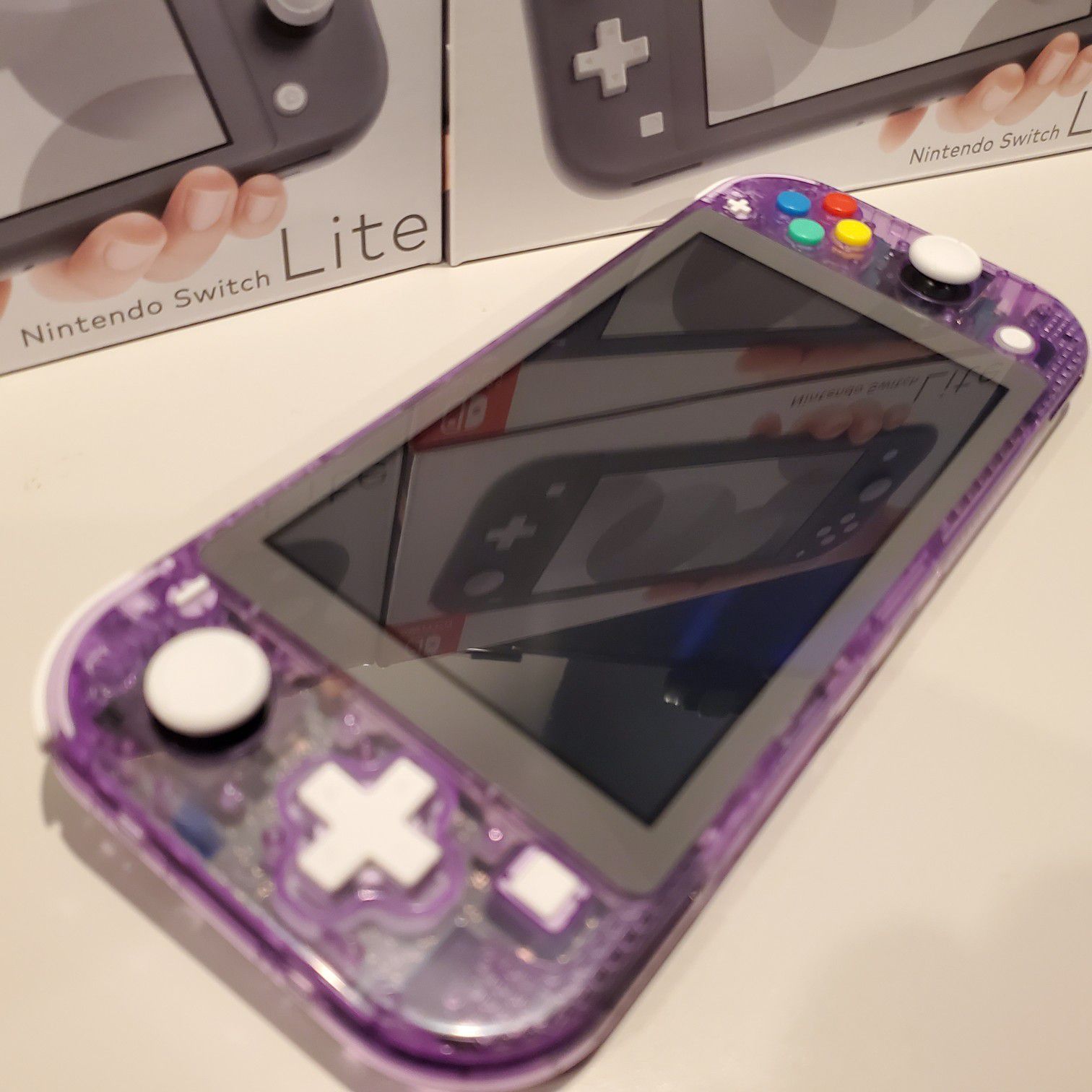 Custom Nintndo switch lite atomic purple with famicom buttons mod