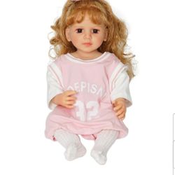 Dollox Reborn Baby Doll Girls
 - 22 inch Realistic Newborn Girls Doll Toddler 
-  Silicone Real Feeling Baby Doll 
- Soft Body 
- Curly Brown Hair 
- 