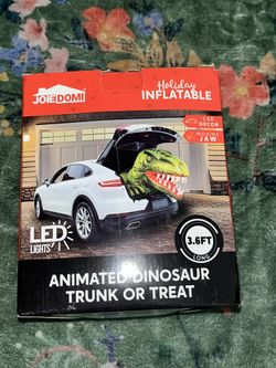 animated dinosaur trunk or treat inflatable
