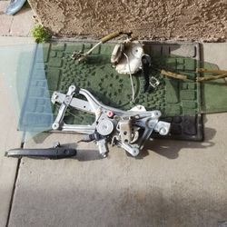 Driver Side Window Glass . Regulator.Door Handles .