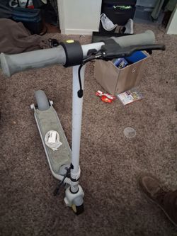 Ninebot electric scooter.  With charger