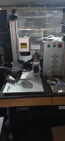 Used low hour 60 watt fiber laser with turret. F254 (175x175) and F290 (220x220) lens.