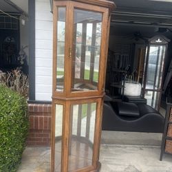 Corner Cabinet Lights Have Glasses Shelves 