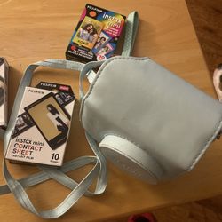 Light Blue Instax Mini 7 Plus Teal Strap And Case. 