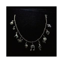 7" Sterling Silver Beaded Charm Bracelet with 10 Charms. Made in Italy, signed