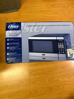 Oster 0.7 Cu. Ft. 700W Microwave Oven - Brand New