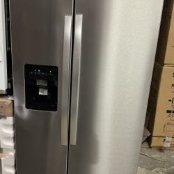 New Whirpool  side by side Refrigerator  24 cuft in stainless steel .