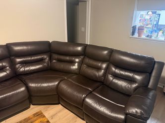 Brown 3 piece leather couch