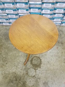 Antique 3 legged table Cushman product