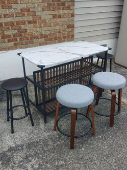 Inas Kitchen Island dining table set.