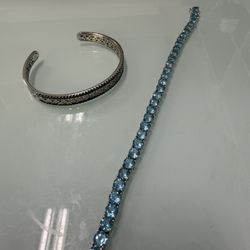 Set de 2 pulseras plateadas con piedras azules 