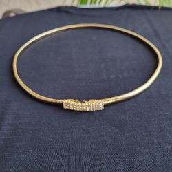 Gold Tone Elastic Metal Omega Belt.