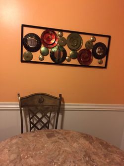 Metal wall art couple months old