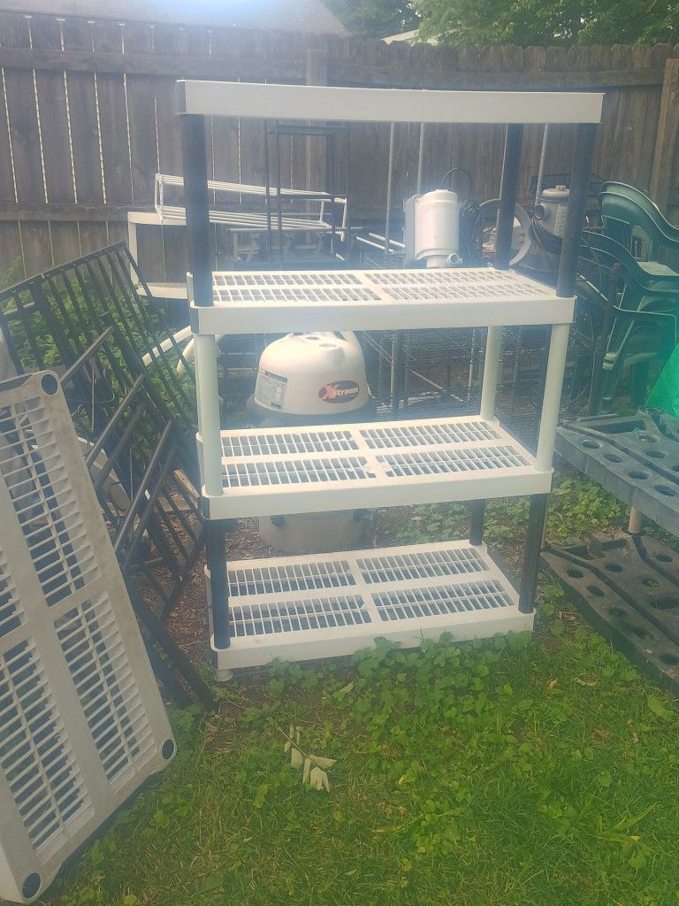 Plastic Shelf With 4 Shelves There's 1 More We Don't Have The Pools For It