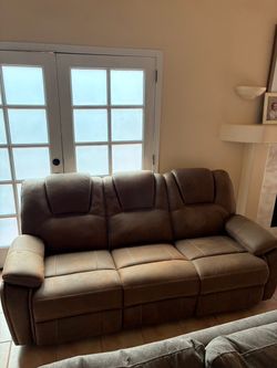 Brown reclining sofa