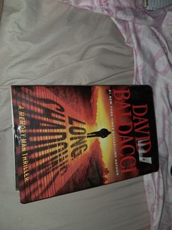 Hardback copy of long shadows by David Baldacci