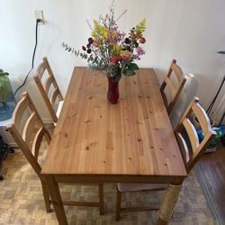 IKEA pine wood table with 4 chairs