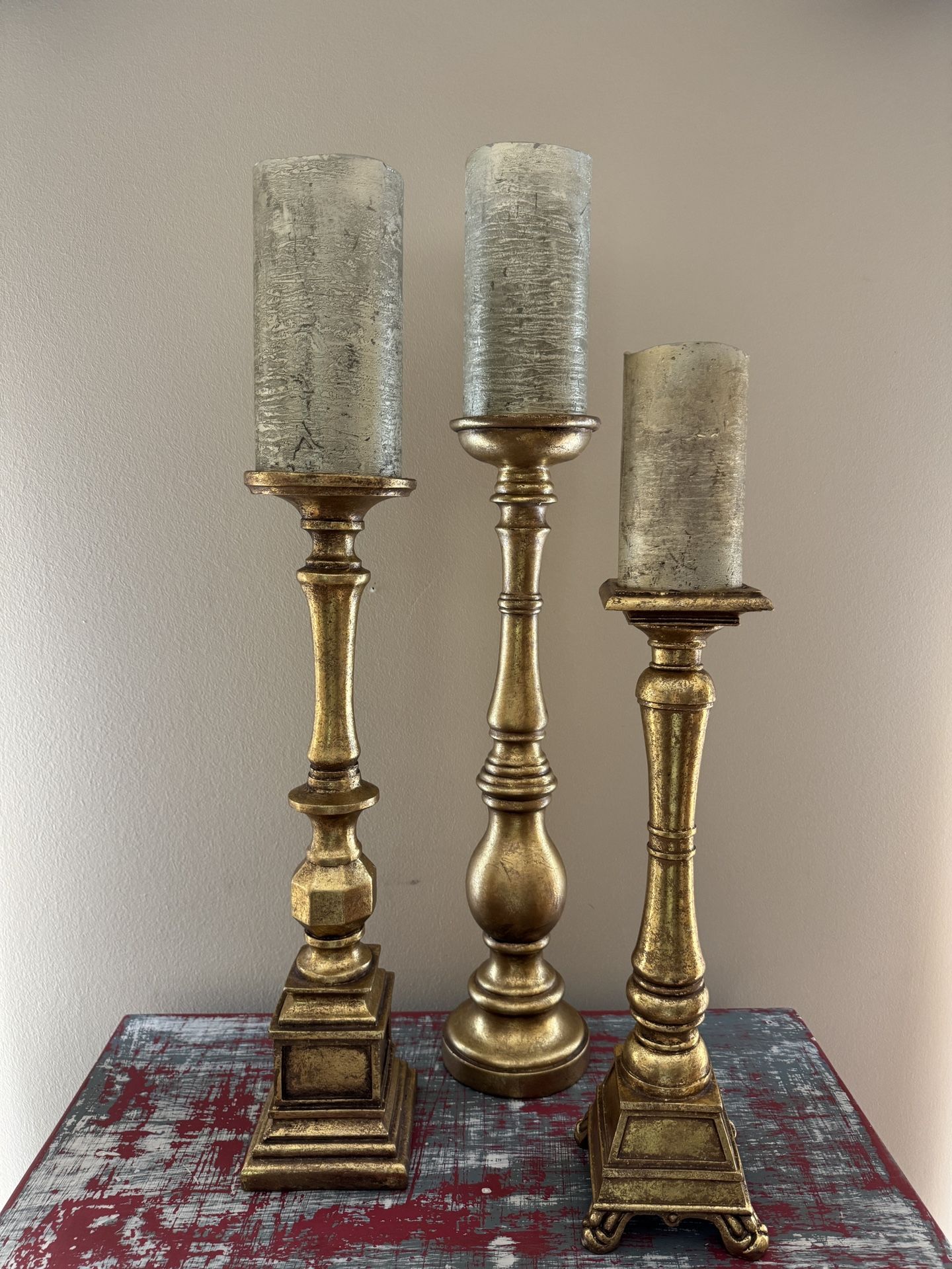 3 TALL WOODEN CANDLESTICKS with CANDLES