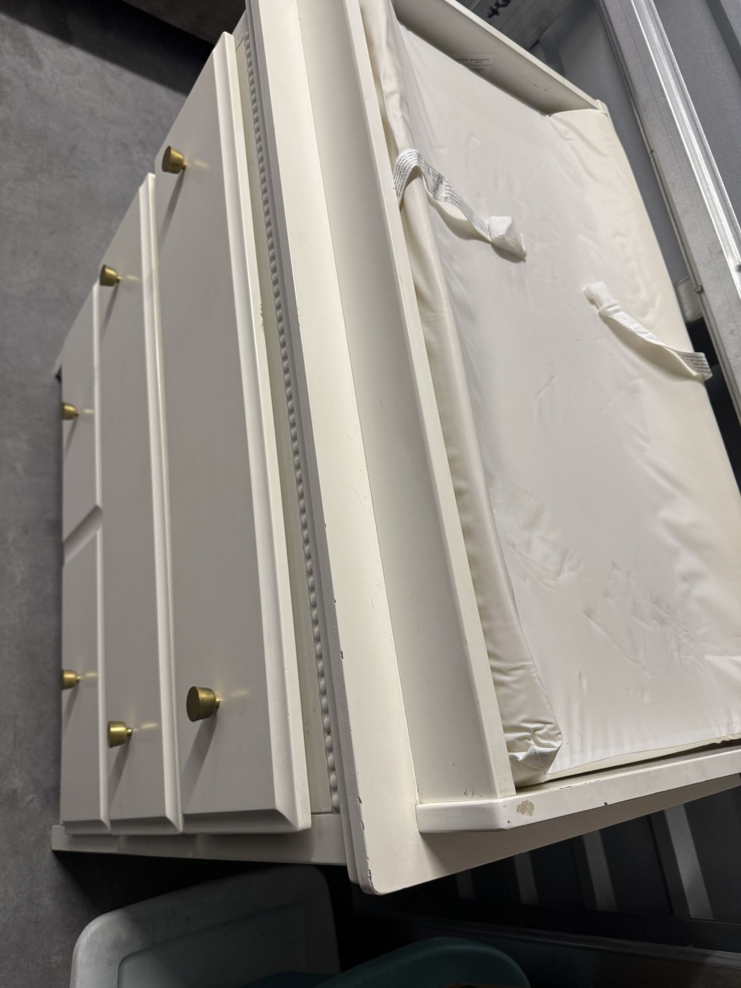 White dresser with changing table